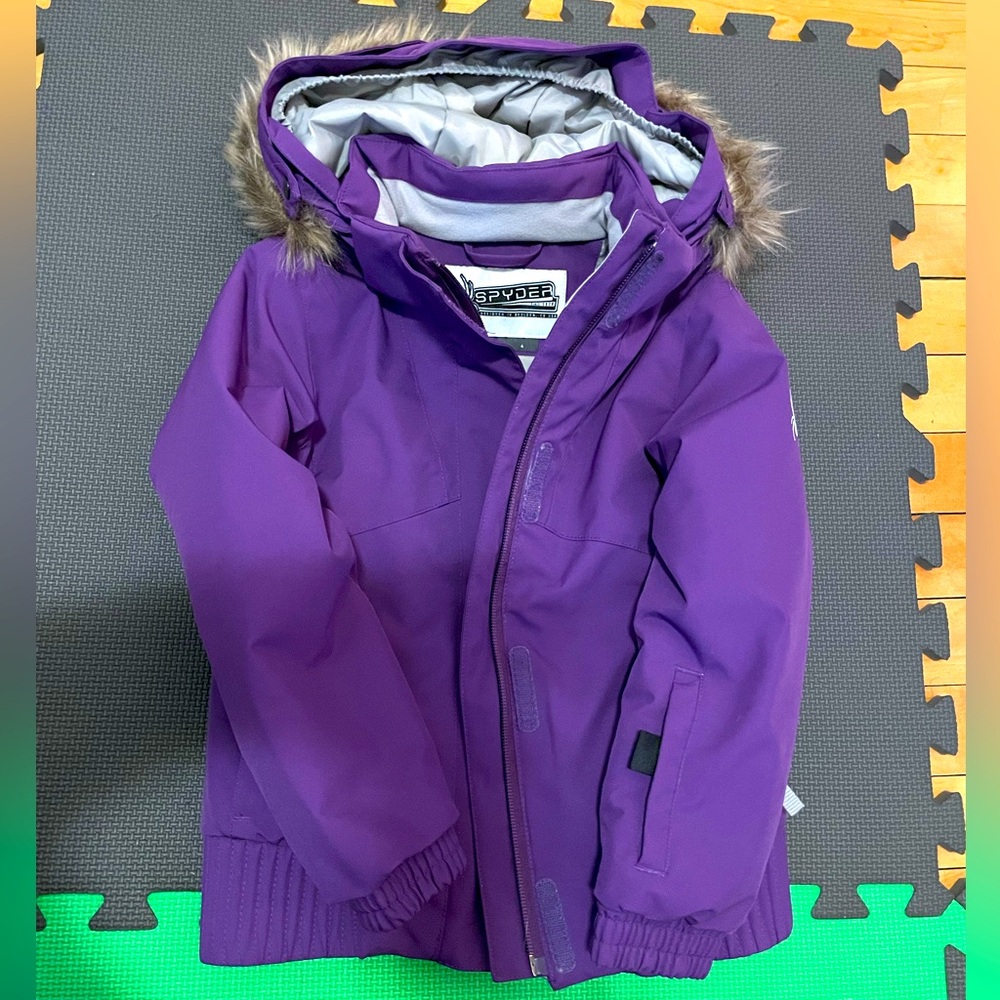 Little girl’s purple Spyder jacket.